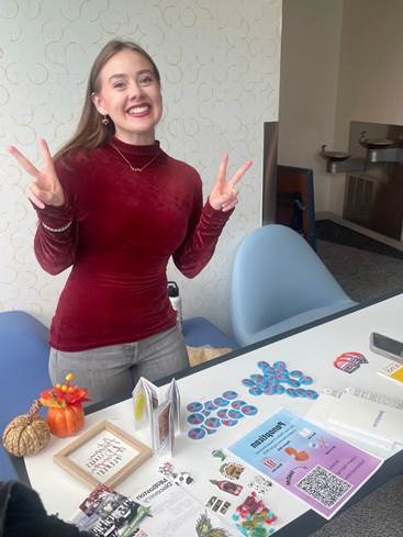 A SLIS Student Leader Ready with Info